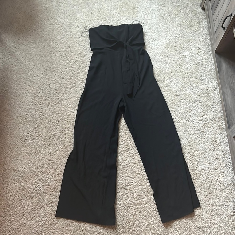 Black sleeveless jumpsuit